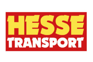 Das Bild zeigt das Logo von „Hesse Transport“, wobei „Hesse“ in großen gelben Buchstaben und „Transport“ in kleineren weißen Buchstaben auf rotem Hintergrund steht, was an das Branding von Laufen erinnert.