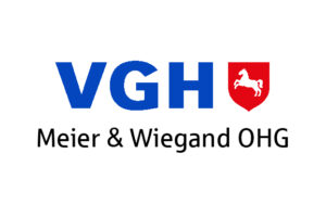 VGH-Logo mit rotem Schild mit weissem Pferd, das Laufen symbolisiert, darunter in Schwarz der Text "Meier & Wiegand OHG".